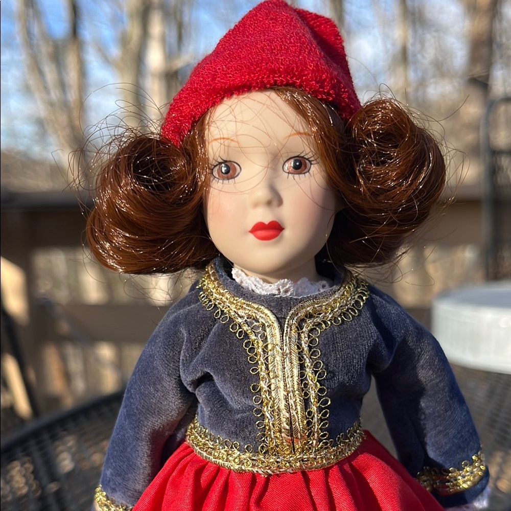 Red and Blue Porcelain Doll